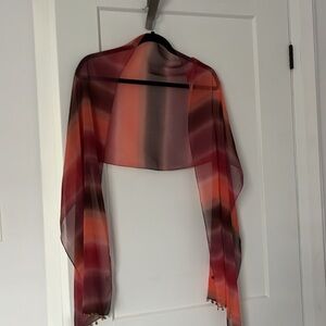 Silk scarf in shade of red, pink, orange and purple